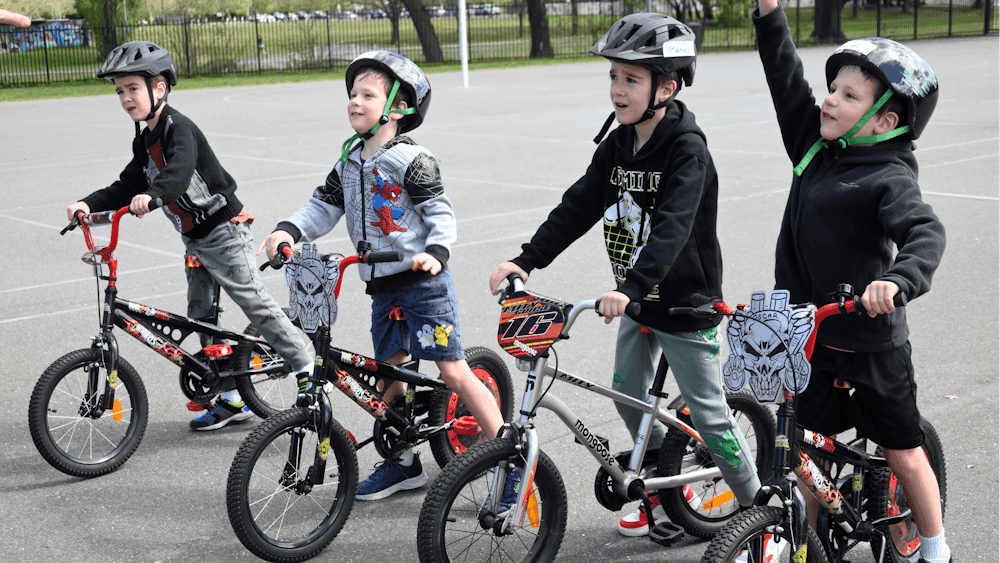 Four young boys with their bikes