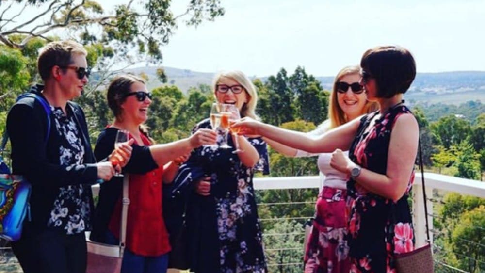 women with wine cheers