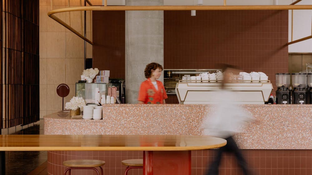 staff member at Redbrick Coffee City