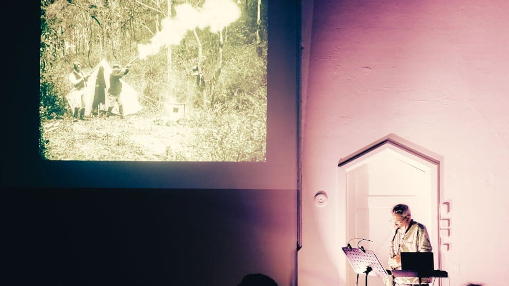 Pictured is Phillip Johnston performing with his saxophone