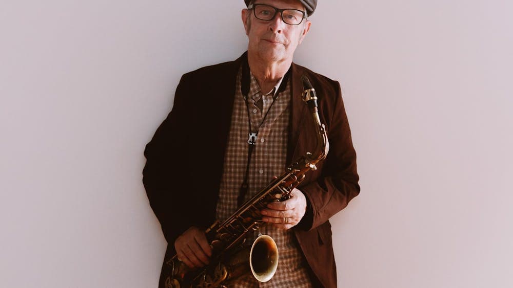 Pictured is Phillip Johnston with his saxophone