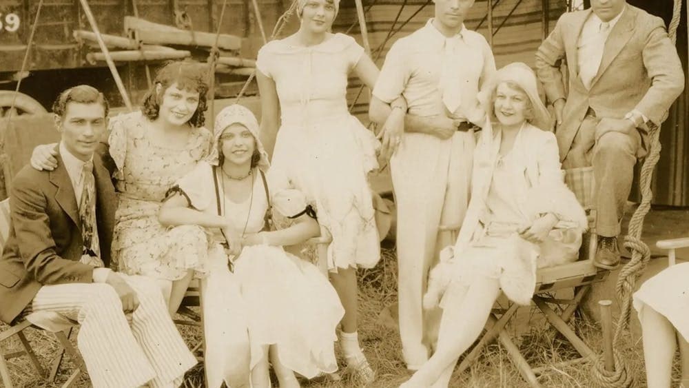 Old photo of a family posing for a photo