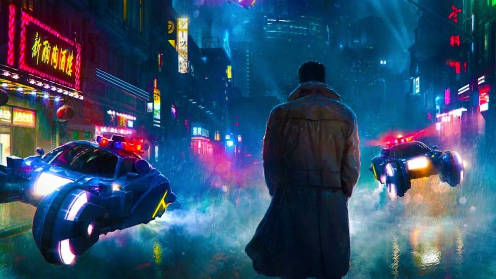 Man in coat standing with his back to us in a cyberpunk scene