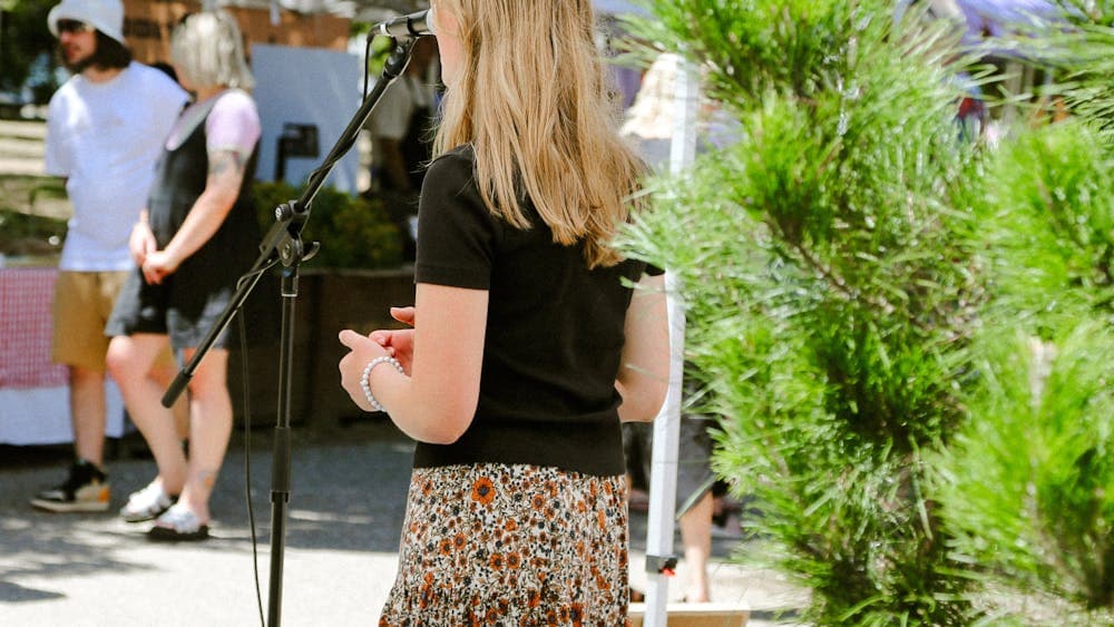 Young musician performing at the markets