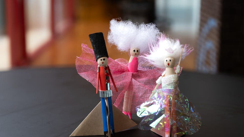Nutcracker peg dolls created using craft materials