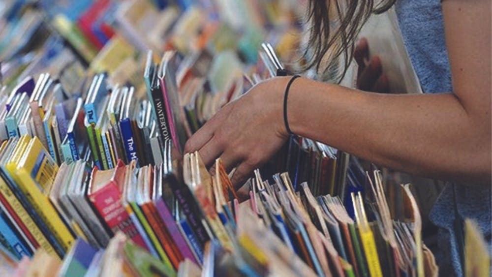 Person shopping for books at the Lifeline Canberra bookfair