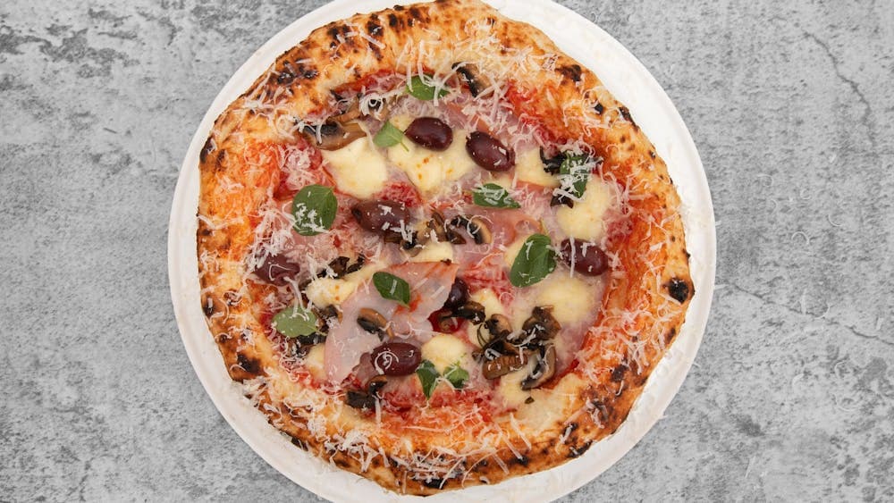 San Marzano Tomatoes, Fior de latte, Double smoke ham, Mushrooms and Olives finish with Oregano