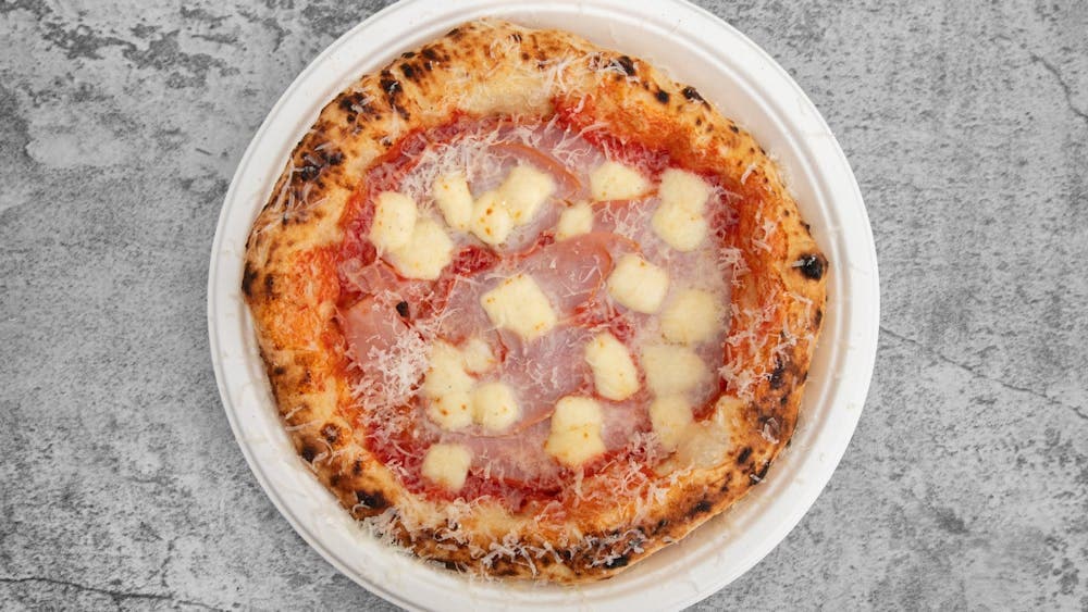 San Marzano Tomatoes, Fior de latte, Double smoke ham, Cinnamon Pineapple and finish with Oregano