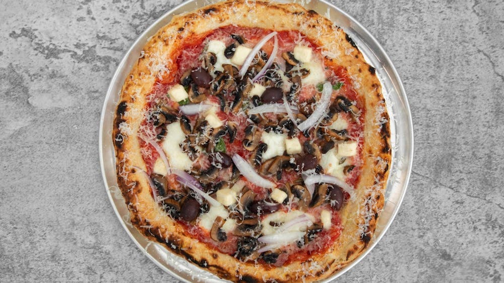 San Marzano Tomatoes, Fior de latte, Mushrooms, Olives, Spanish onion finish with Spicy Hot Peppers