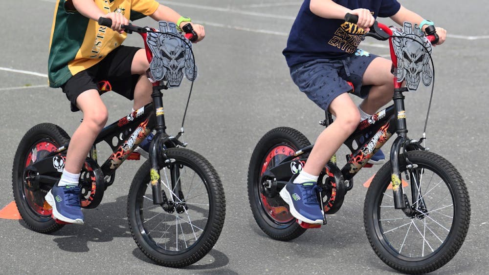 Twins on bikes