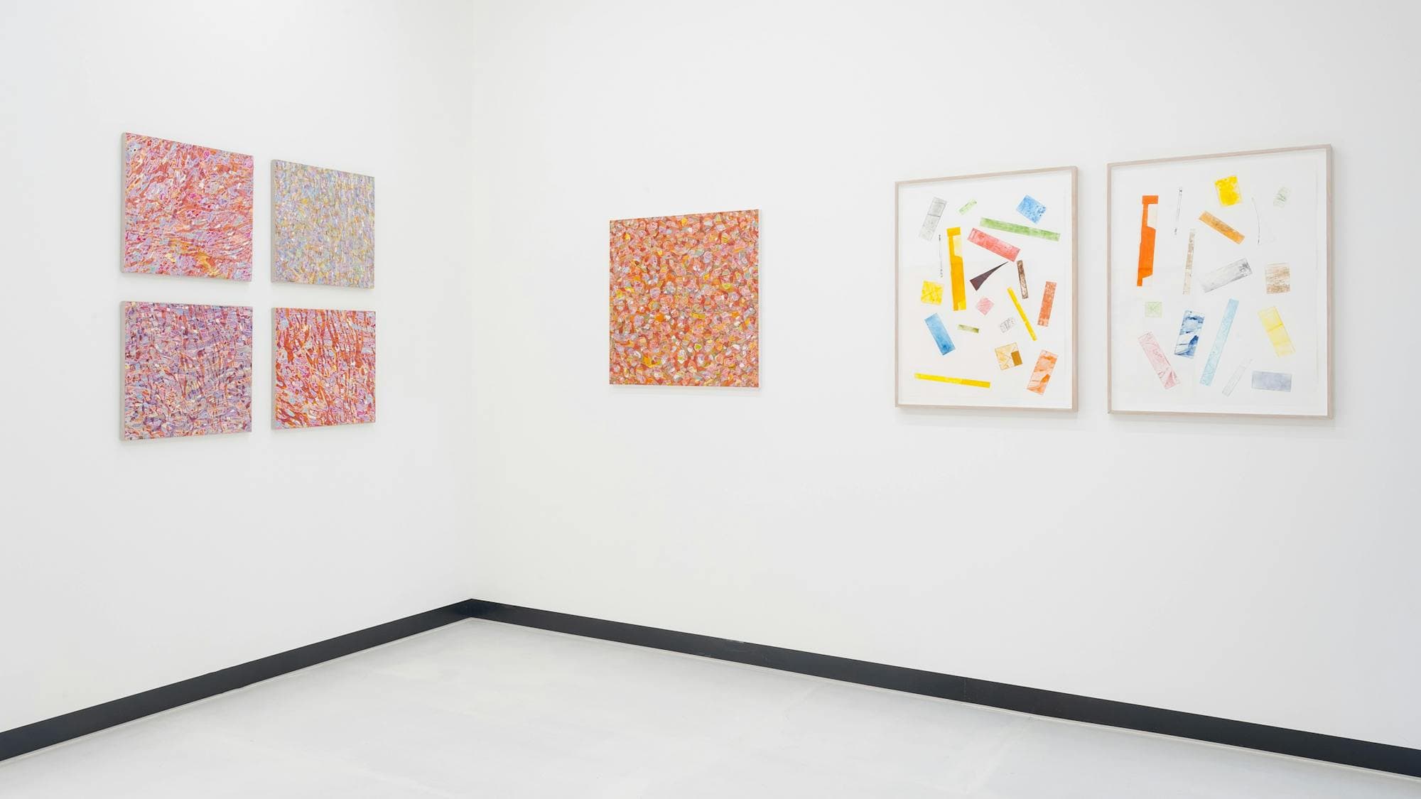 Photo of paintngs installed in gallery