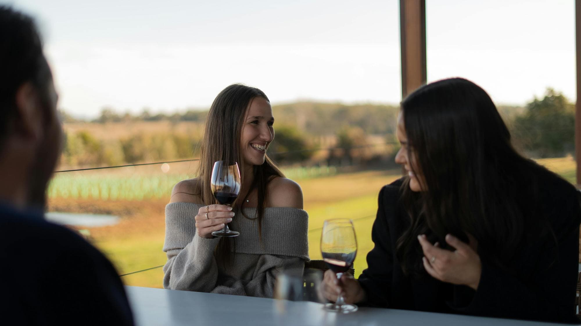 Wine Hopper guests enjoying a wine.
