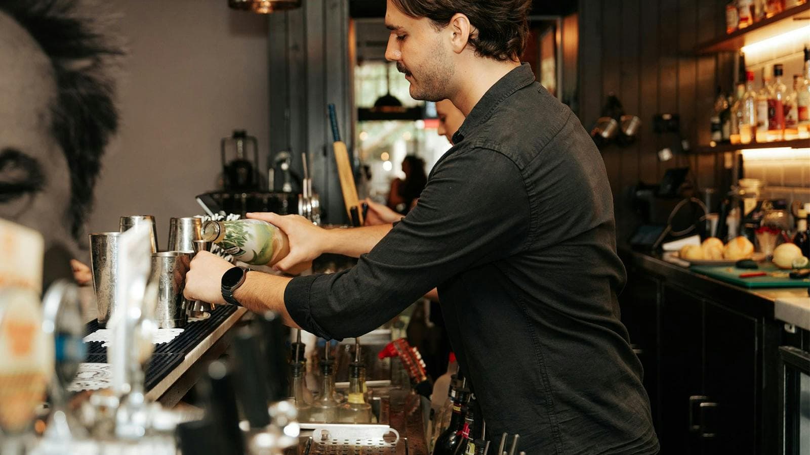 Staff behind the bar at PJs in the City