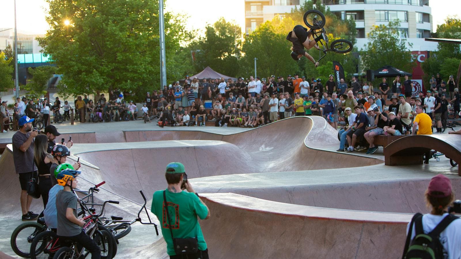 Jason Watts riding Belconnen skatepark at ACT JAM 2023 with crowd in background